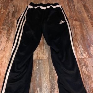Black and right original Adidas with zipper.